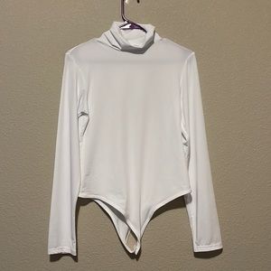 White turtleneck body suit, never worn